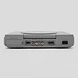Back view of the grey PlayStation 1 console showing the parallel I/O, audio, video, AV multi, and AC power ports