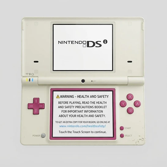 Open white and pink Nintendo DSi handheld console with a health and safety warning displayed on the bottom screen