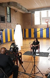 Multi camera documentary production setup on a Chicago gymnasium set