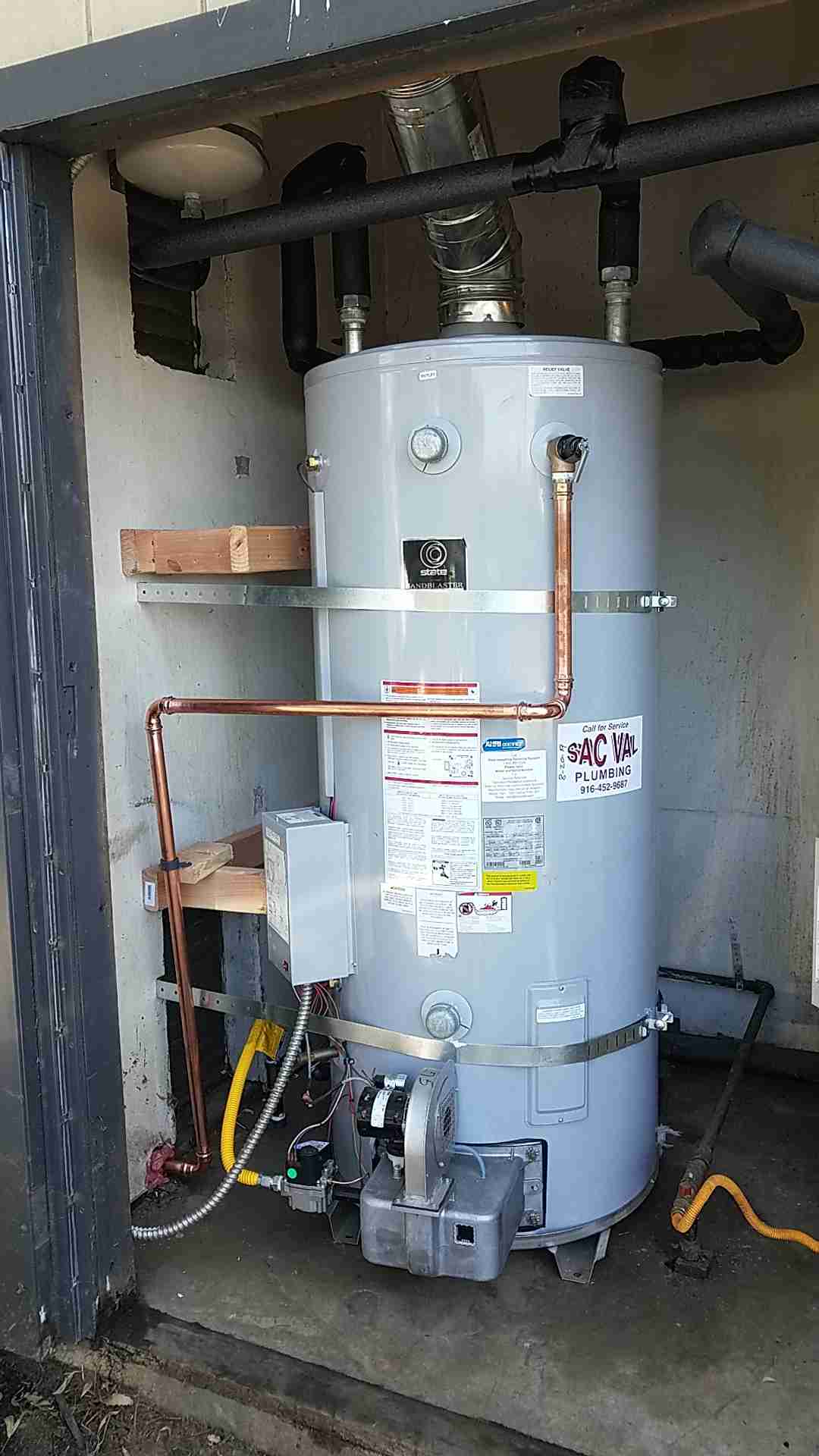 Residential water heater installation with copper piping