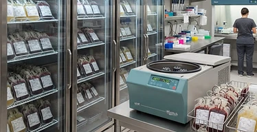 Blood Bank Centrifuge — Blood bank refrigerators and centrifuge with labelled blood units in a hospital blood bank
