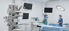 Anaesthesia Pendant — Ceiling-mounted surgical pendant booms carrying monitors and equipment in an operating theatre