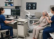 Neuro Navigation System — EEG machine with electrodes and neuro navigation workstation in a neurology diagnostic room