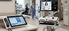 Esaote SUITESTENSA CVIS Platform — Nurse call master station with telemedicine cart and hospital information displays