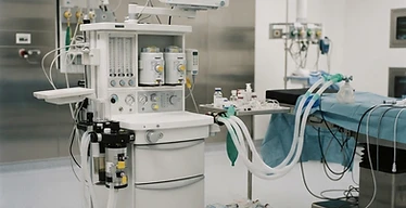 Laryngeal Mask Airway Set — Anaesthesia workstation with breathing circuit and patient monitors in an operating theatre