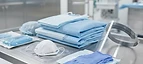 Surgical Gowns (Pack) — Personal protective equipment with surgical gowns, gloves, face shields and respirators