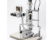 iON Digital Imaging System for Slit Lamps — Slit lamp microscope and phoropter refraction unit in an ophthalmology examination room