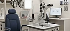 Tonometer — Slit lamp microscope and phoropter refraction unit in an ophthalmology examination room