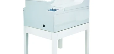 Wincom XRP-14 medical X-ray film processor with control panel on four-legged floor stand