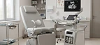 Fetal Monitor — Gynaecology examination chair with obstetric ultrasound machine in a clinic room