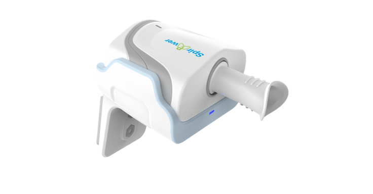 Spirower infant lung function tester handheld sensor unit mounted on a mobile workstation cart with monitor, keyboard tray and printer