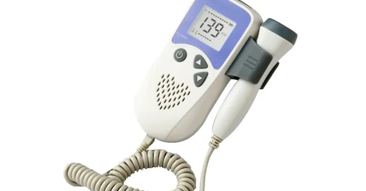 Wincom FD-A20A handheld fetal doppler with blue LCD showing fetal heart rate in BPM and side-docked probe