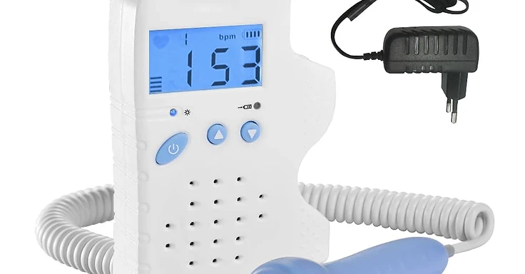 White handheld fetal doppler with LCD heart-rate display in bpm, three blue buttons, bell-shaped transducer probe on coiled cord and AC adapter