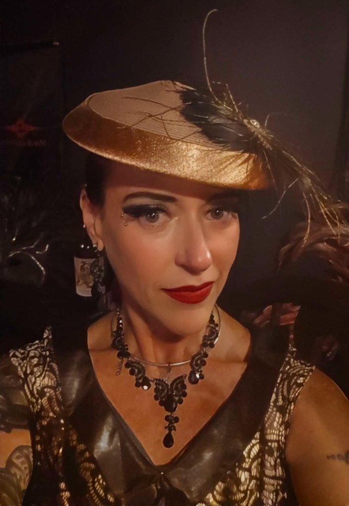 Odessa gold-hat glam portrait