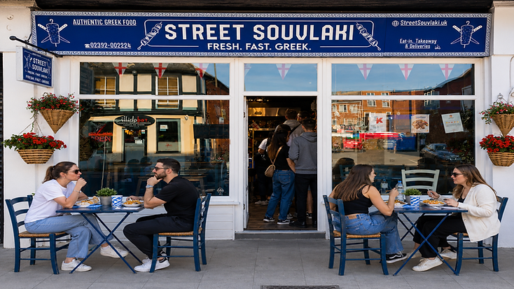 Customers dining outside Street Souvlaki