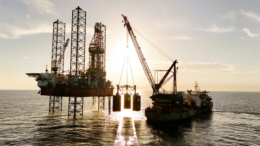 Offshore rig at sunset