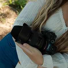 Emma holding her camera