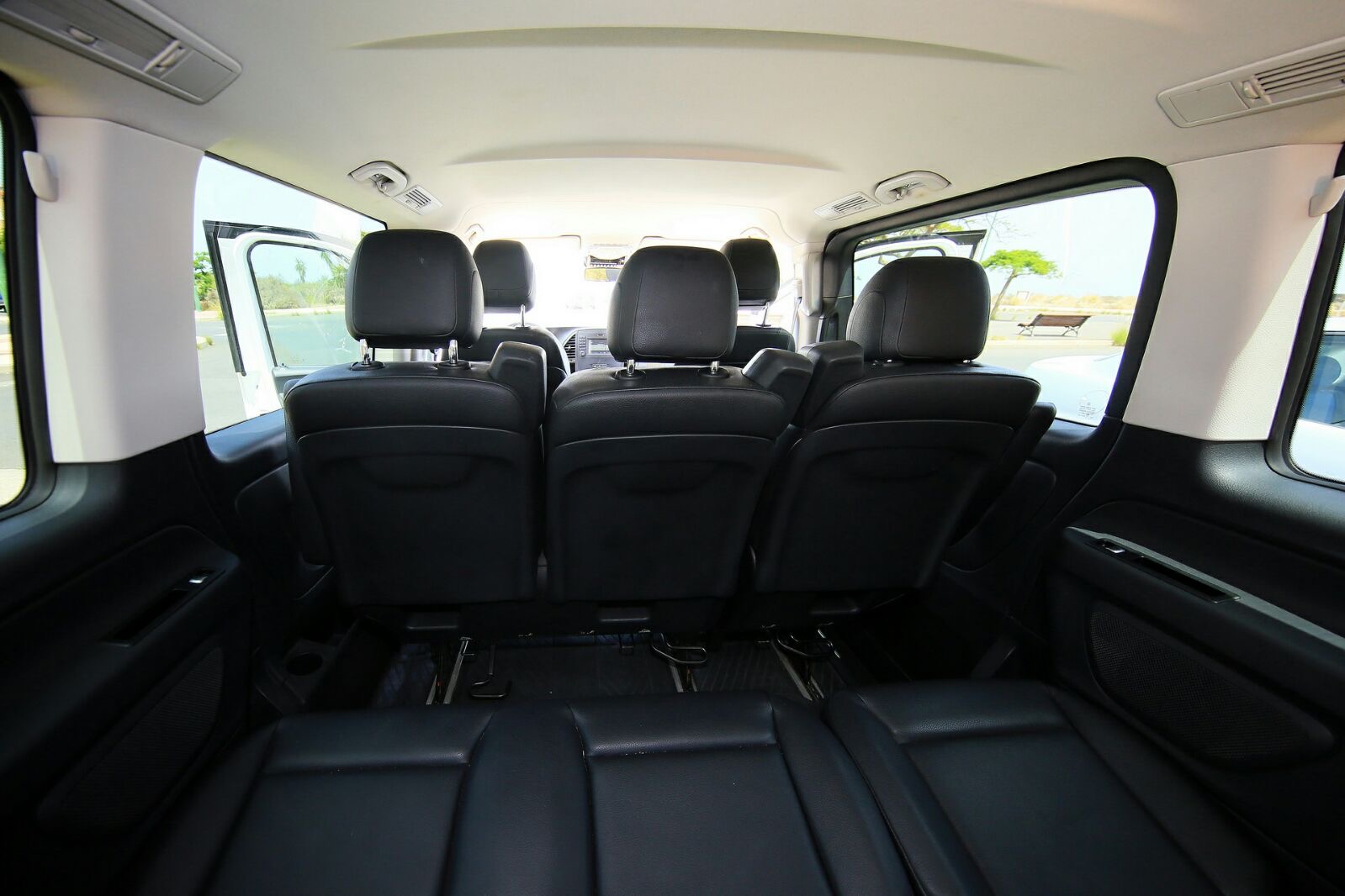 Interior — three rows of seating from the back