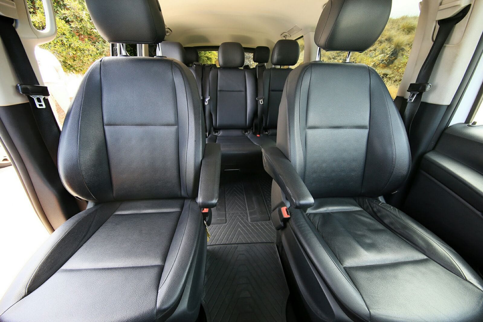 Interior — captain chairs and rear rows