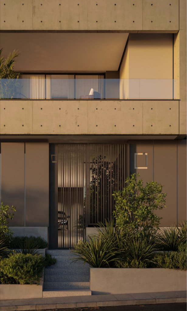 NAYA Residences — entrance detail in the evening