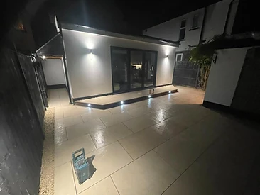 Porcelain patio with timber pergola over an entertaining space in Surrey