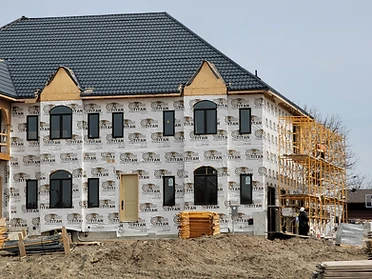Custom home exterior during construction