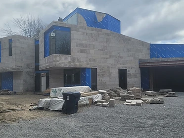 Custom home masonry and glazing progress