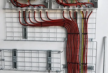Neatly terminated distribution boards with cable management.