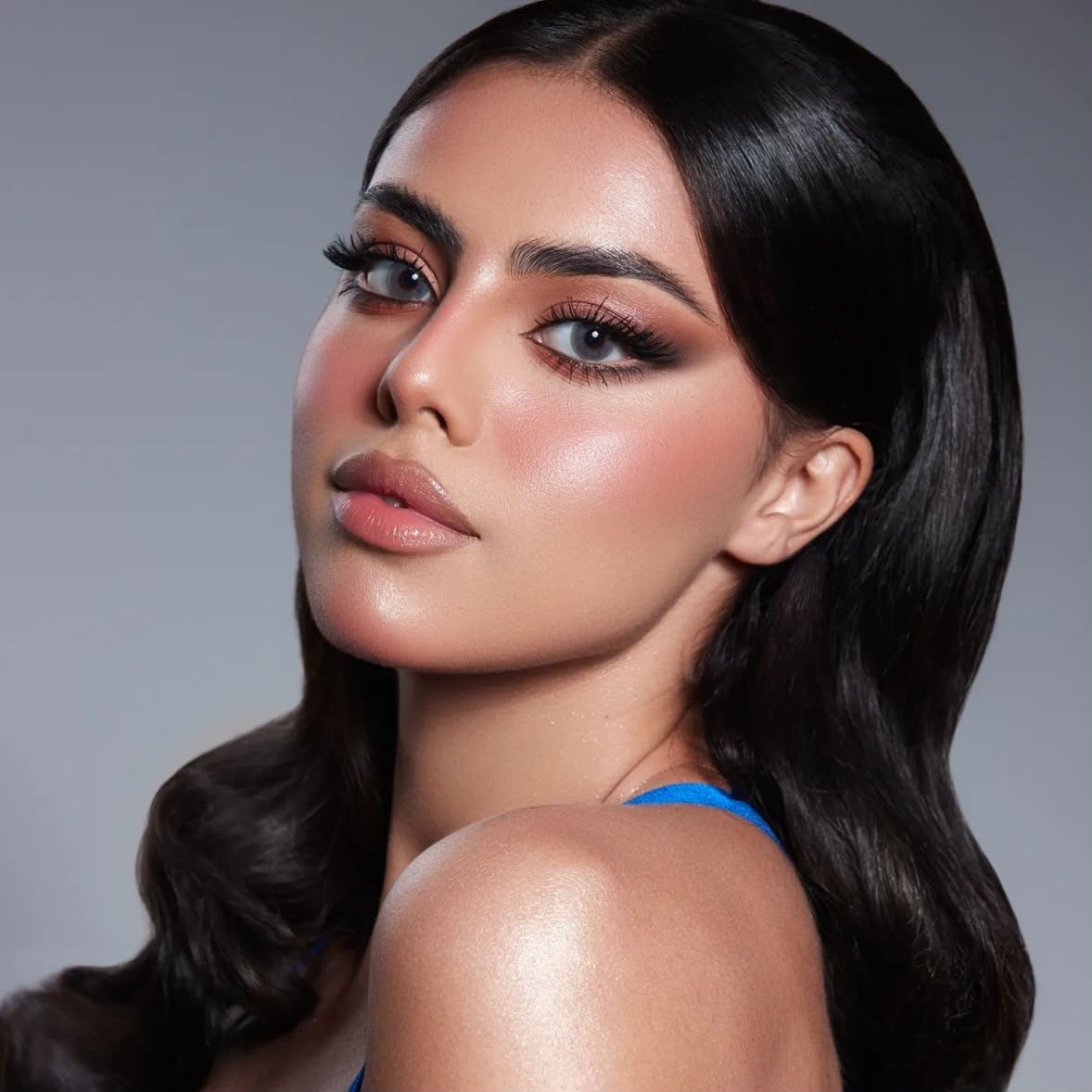 Lady D Beauty Lounge — warm glam black hair closeup