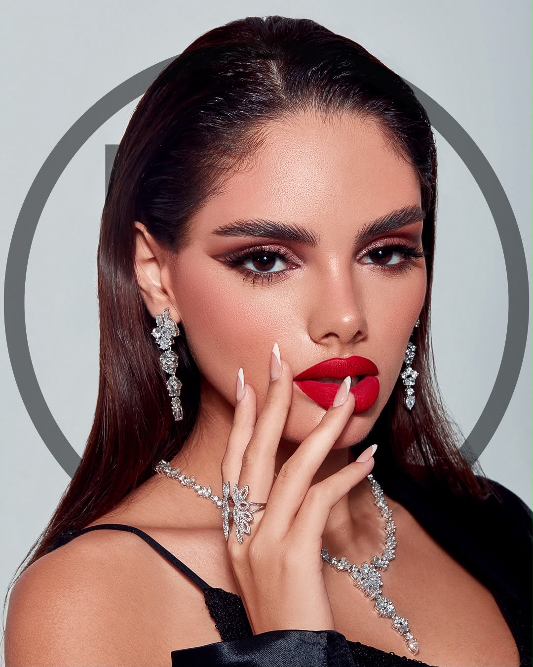 Lady D Beauty Lounge — bold red lip jewellery glam portrait
