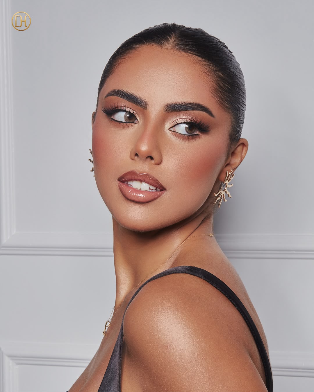 Lady D Beauty Lounge — bronzed glam makeup portrait
