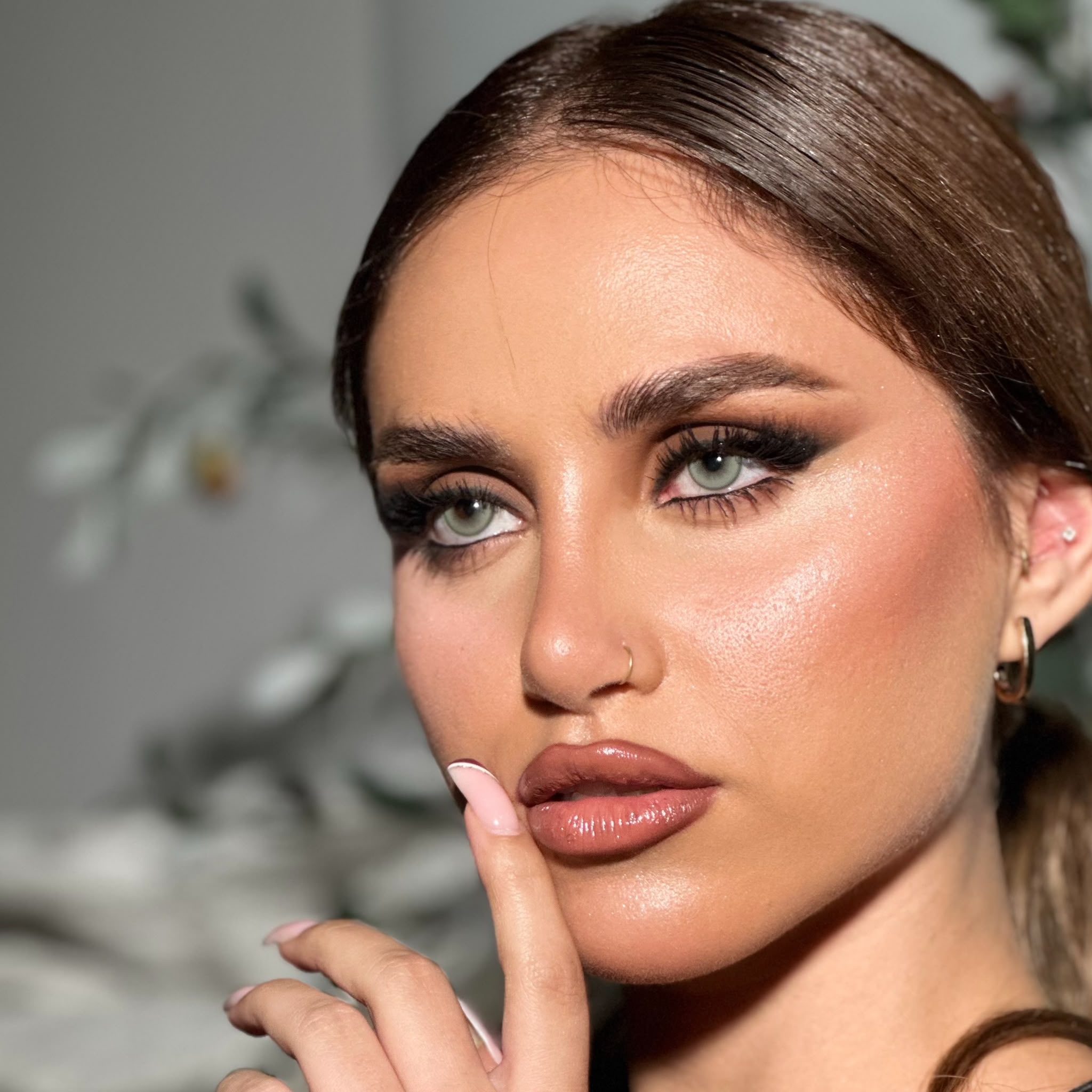 Lady D Beauty Lounge — brunette glam makeup closeup