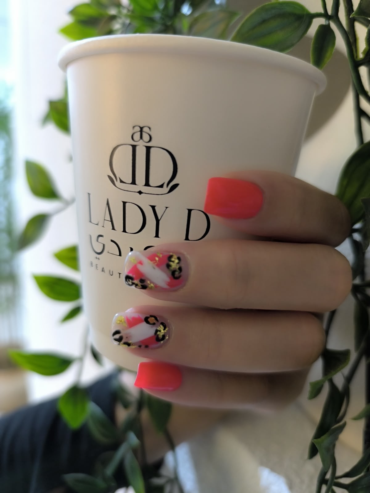 coral floral nail art by Lady D Beauty Lounge