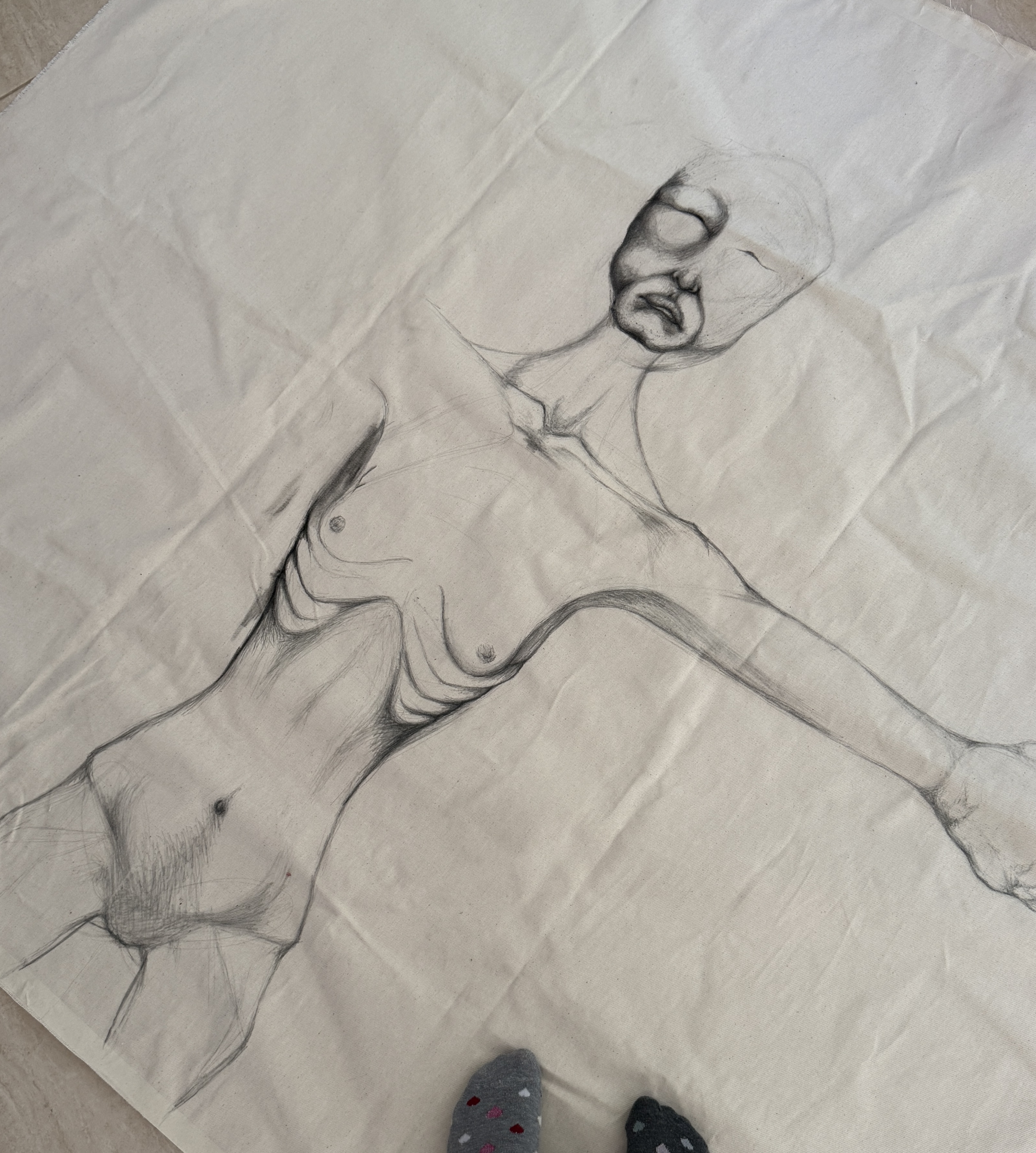 Large pencil figure drawing on loose unstretched canvas