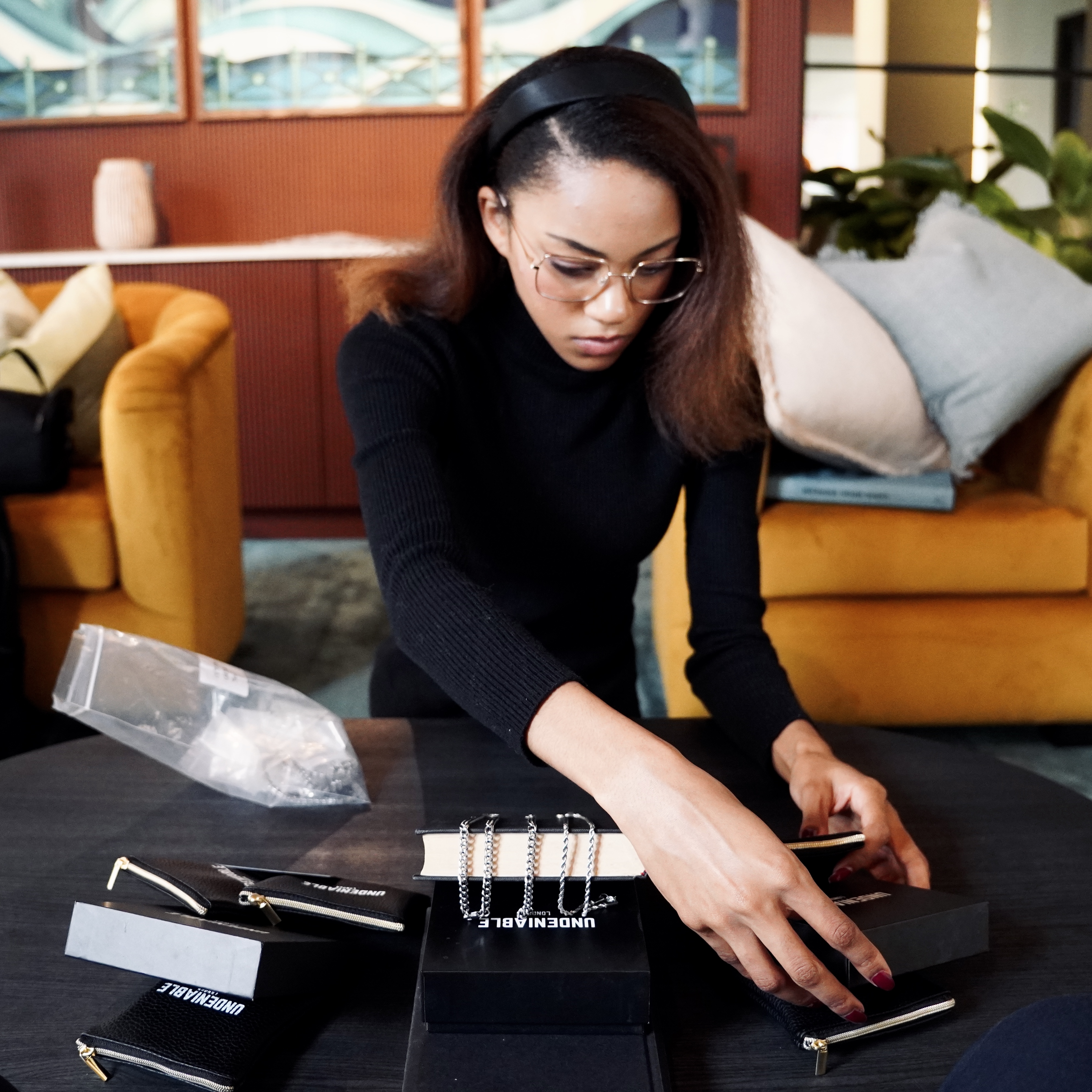 Christiana arranging Undeniable London jewellery packaging