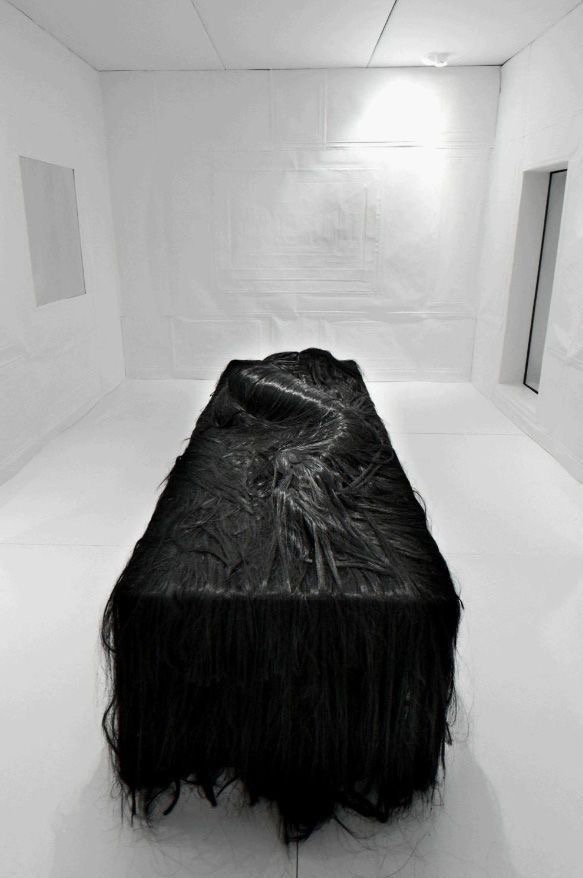 Simon Schubert Sleeping Woman rendered in white folded paper