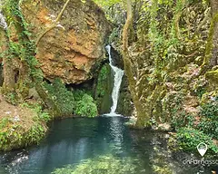 Mantamion Waterfall flowing into a natural pool beside the Polydrosos forest trail