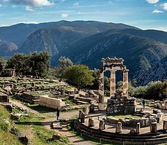 The Tholos of Athena Pronaia at the sanctuary of Delphi, with its standing columns and surrounding ruins