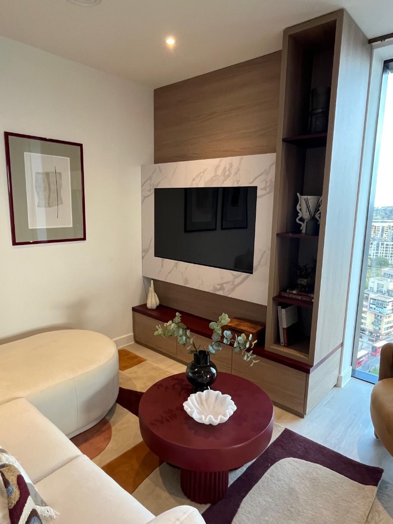 Marble Feature Panel — Recessed TV with warm LED display shelving