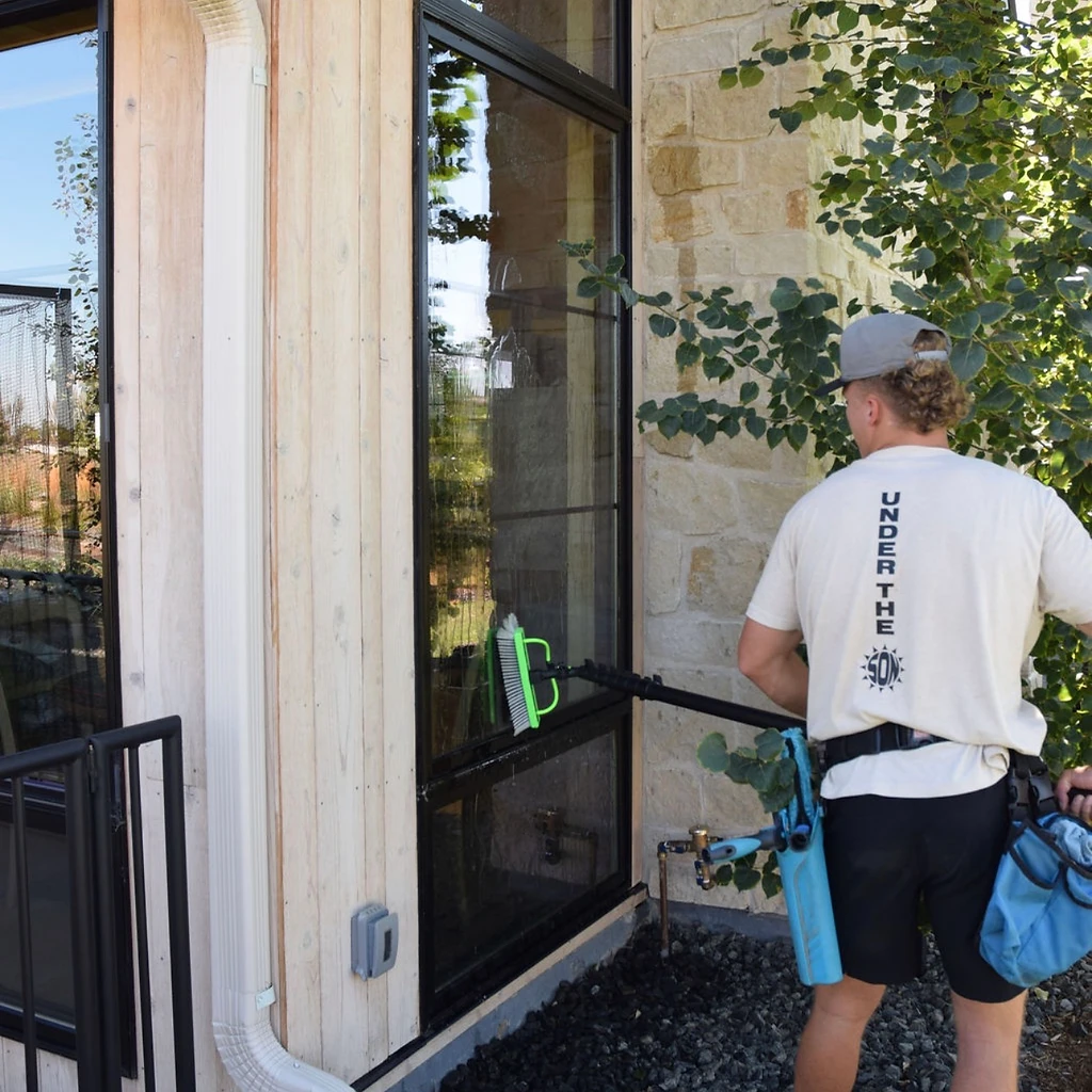 Professional window cleaning on a Northern Colorado home