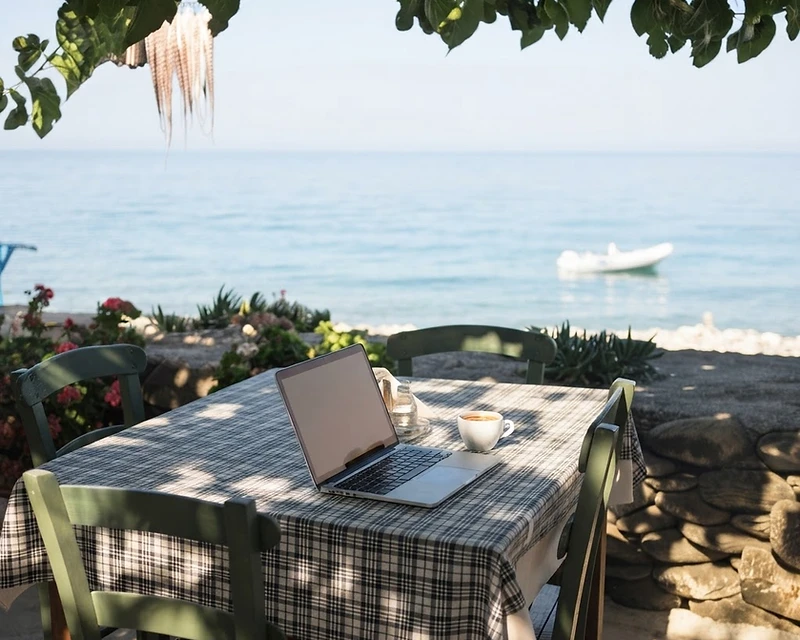 A modern writing desk with an open notebook and fountain pen