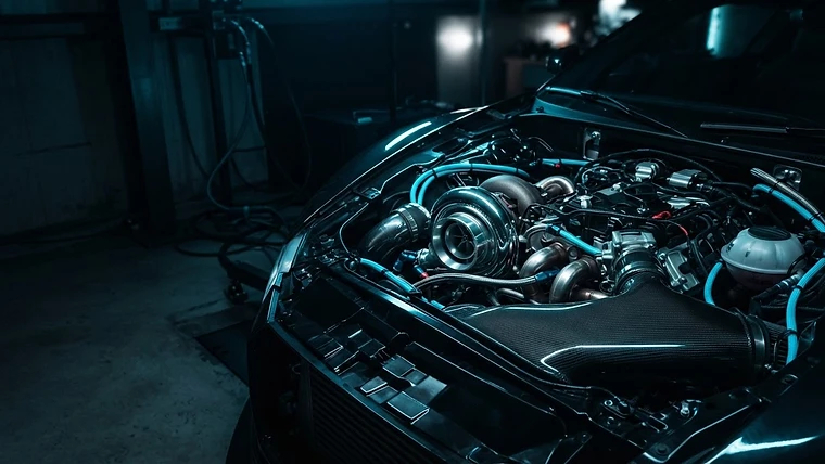 Engine bay of a turbocharged car being calibrated