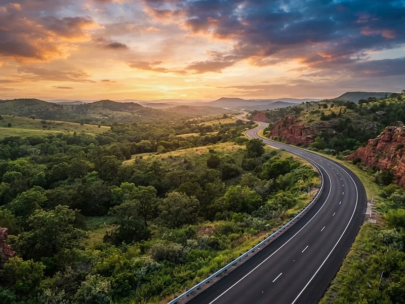 Oklahoma scenic highway through rolling hills at golden hour
