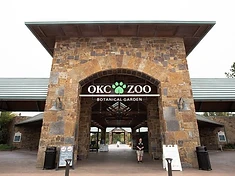 Oklahoma City Zoo — entrance gate and expansive grounds with lush landscaping