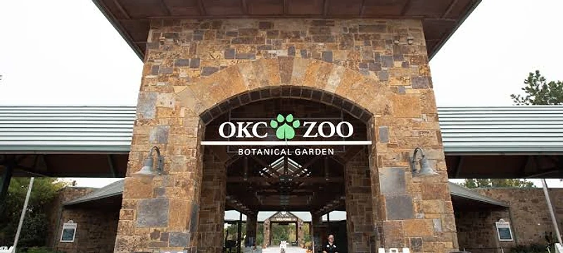 Oklahoma City Zoo — entrance gate and expansive grounds with lush landscaping