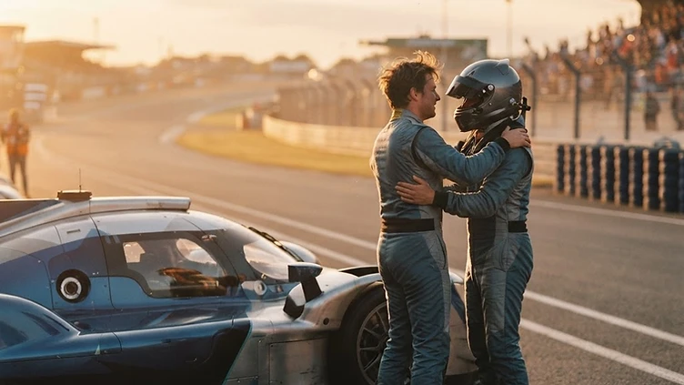 RACING RIVAL BECOMES LIFESAVING HERO