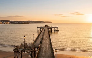 RESTORATION OF HISTORIC PIER GATHERS PACE