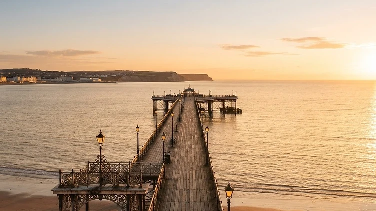 RESTORATION OF HISTORIC PIER GATHERS PACE