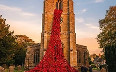 A Sea of Remembrance: Widnes Church Unveils Massive Poppy Cascade