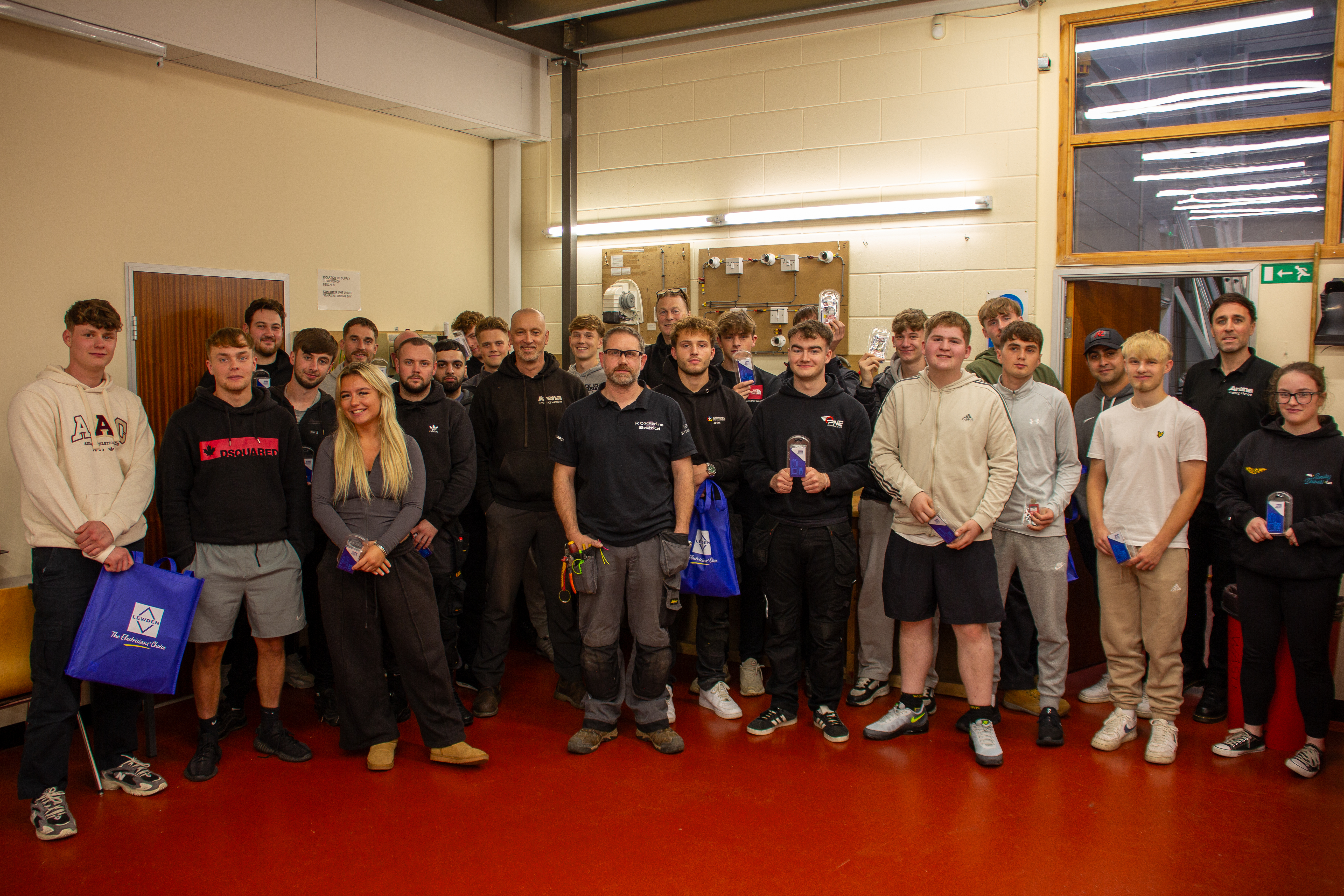 Apprentices and instructor group photo at Arena Training Centre